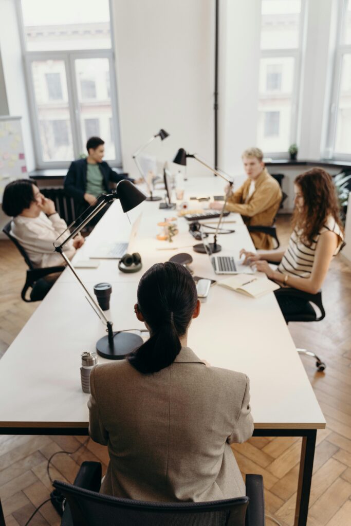 pexels-photo-7438102-7438102 Collaborative business meeting in a modern office with diverse colleagues.